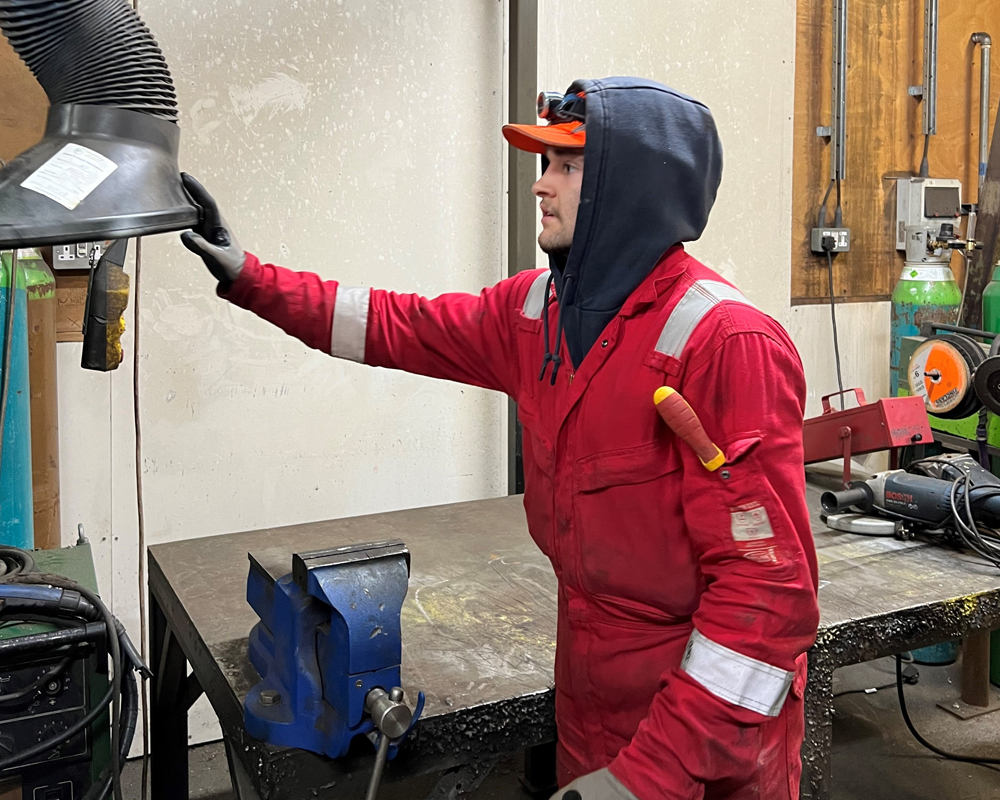 Teegan Brabant, a current engineering apprentice at Crisp Malt, in the workshop.