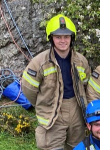 Calum McIntosh in his fireman's uniform