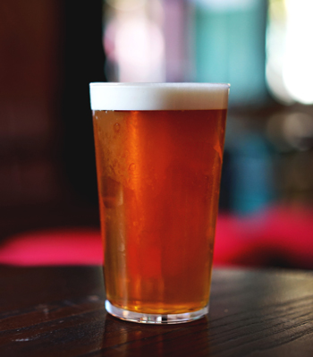 Pint of beer on a table