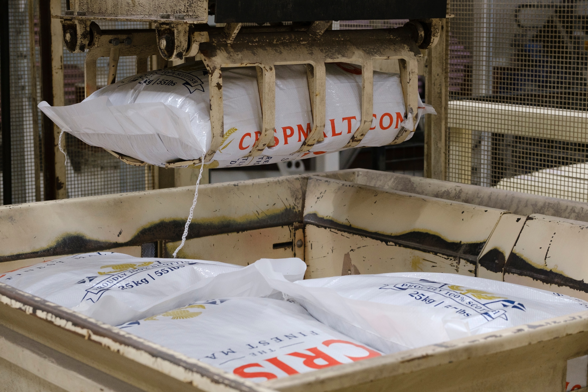 Scottish brewing and distilling malt being packed at Alloa inn Scotland