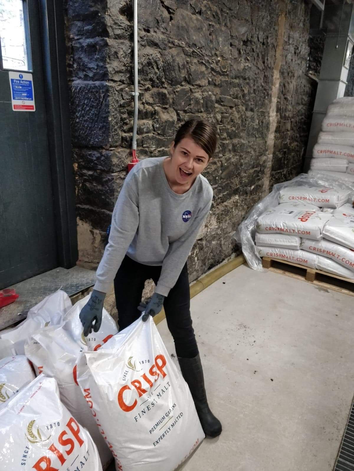 Dr Rutele Marciulionyte at Holyrood moving Crisp Malt sacks