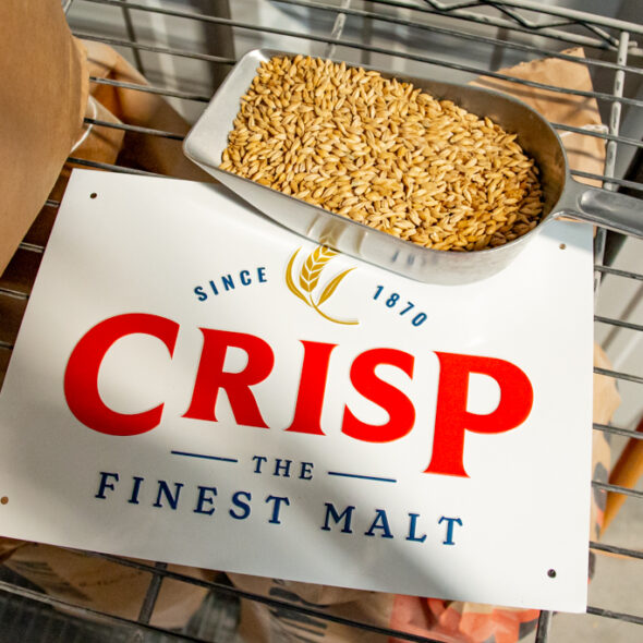 Crisp Malt enamel sign and malt samples used at Crisp Malt events
