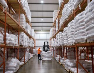 Crisp Malt malting barley sacks stacked in the Great Ryburgh warehouse.