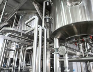 Mash conversion vessels at a craft brewery