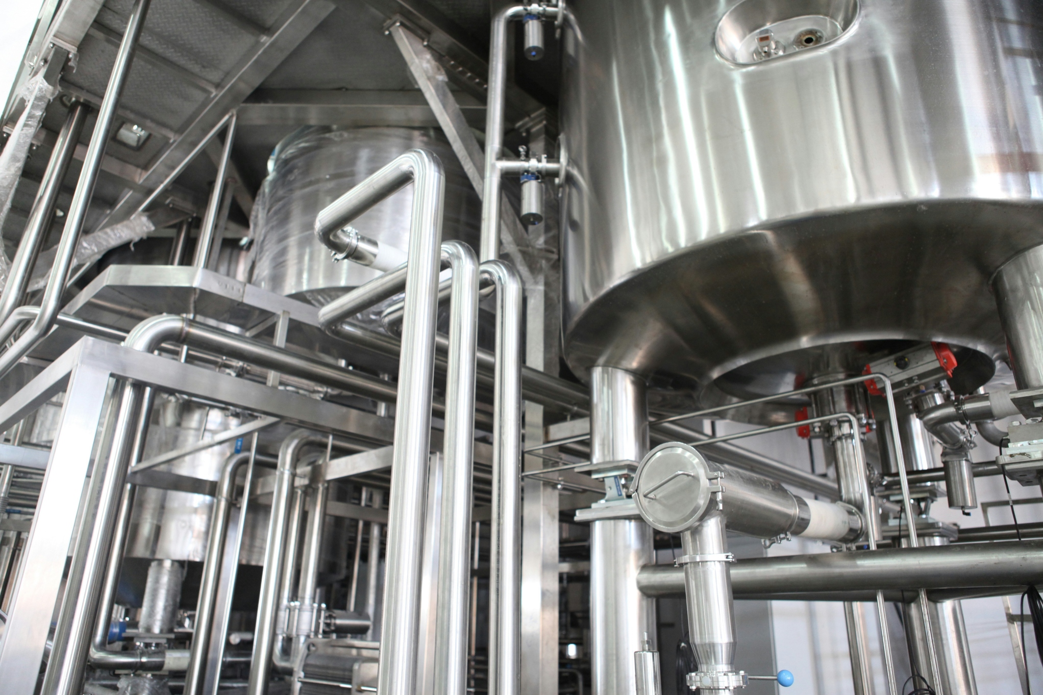 Mash conversion vessels at a craft brewery