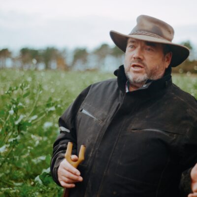 Crisp Malt barley farmer headshot in a field to discuss cover cropping